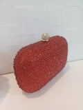 RED EMBELLISHED CLUTCH BAG