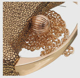 Gold gala pebble clutch bag