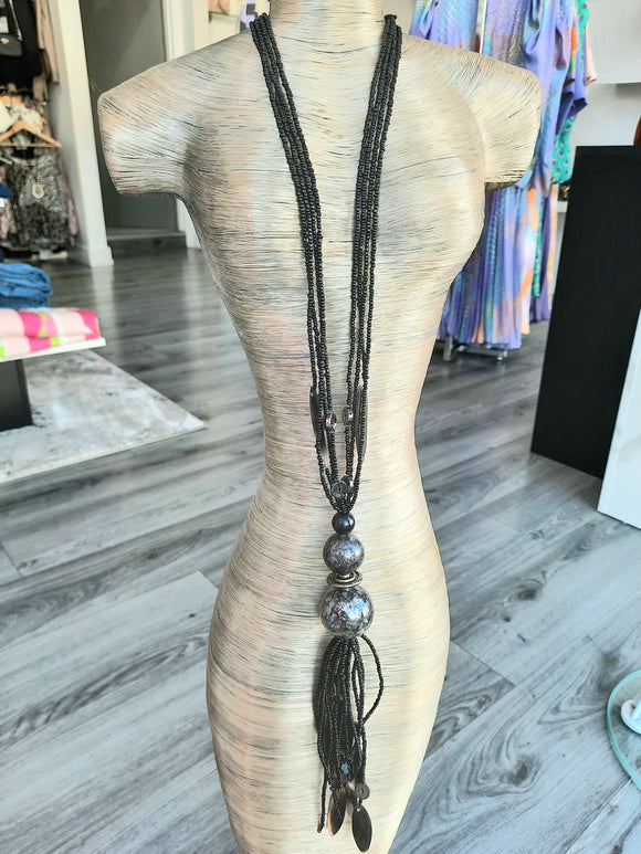Long necklace with tassle